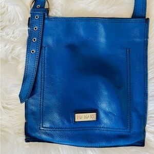 Hadaki women’s crossbody leather purse w strong magnetic closure, gently used